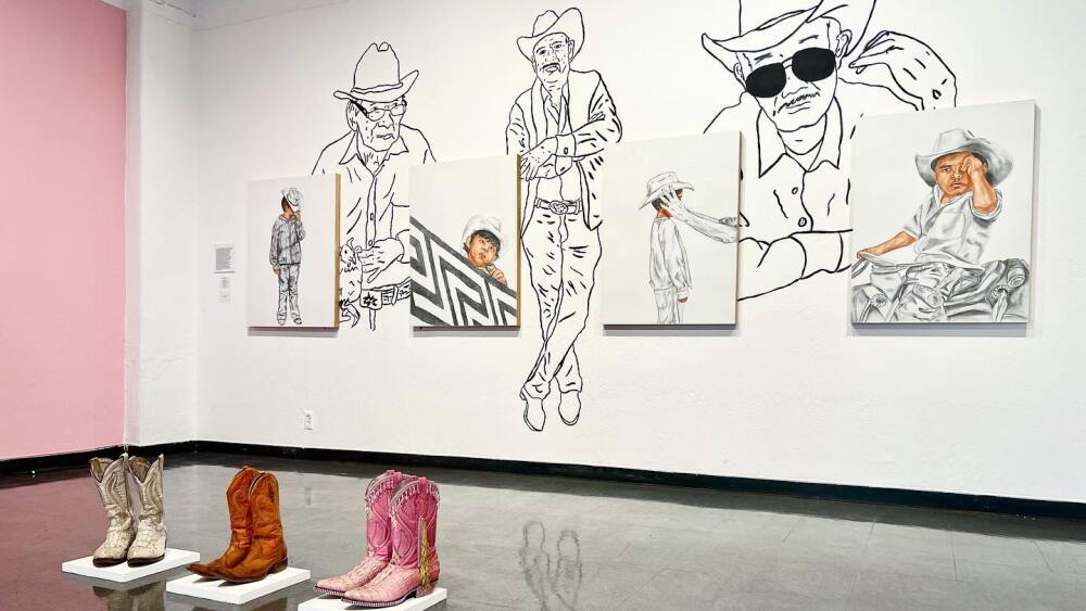 Three pairs of cowboy boots sit in front of four drawings of a kid in a cowboy hat.