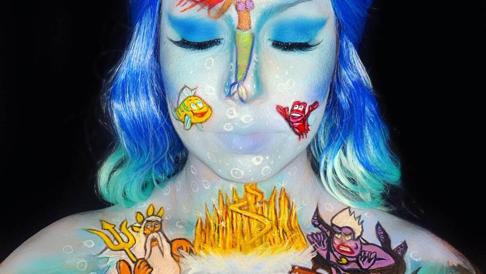 A woman with makeup inspired by the "Little Mermaid"