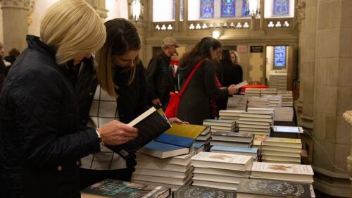 People browsing books at the Boston Book Festival.