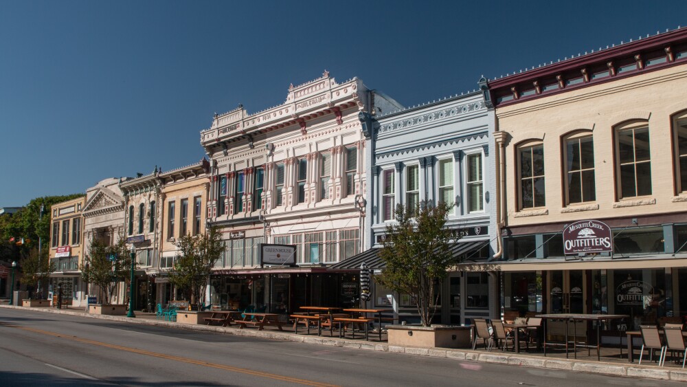 A view of local shops and restaurants in downtown Georgetown, TX.