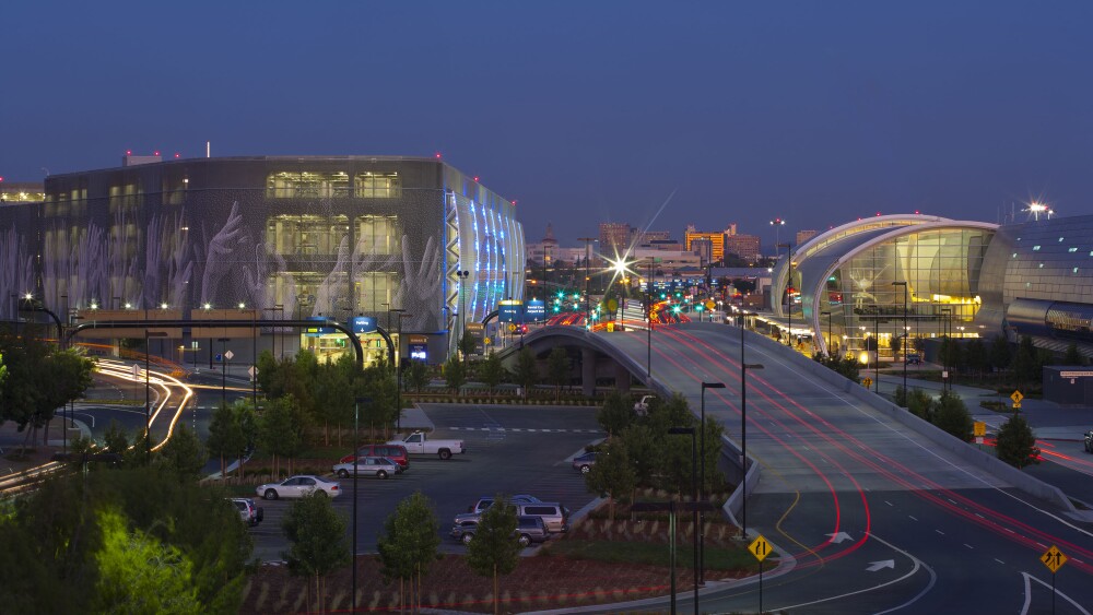 The outside of San Jose Mineta International Airport at night.
