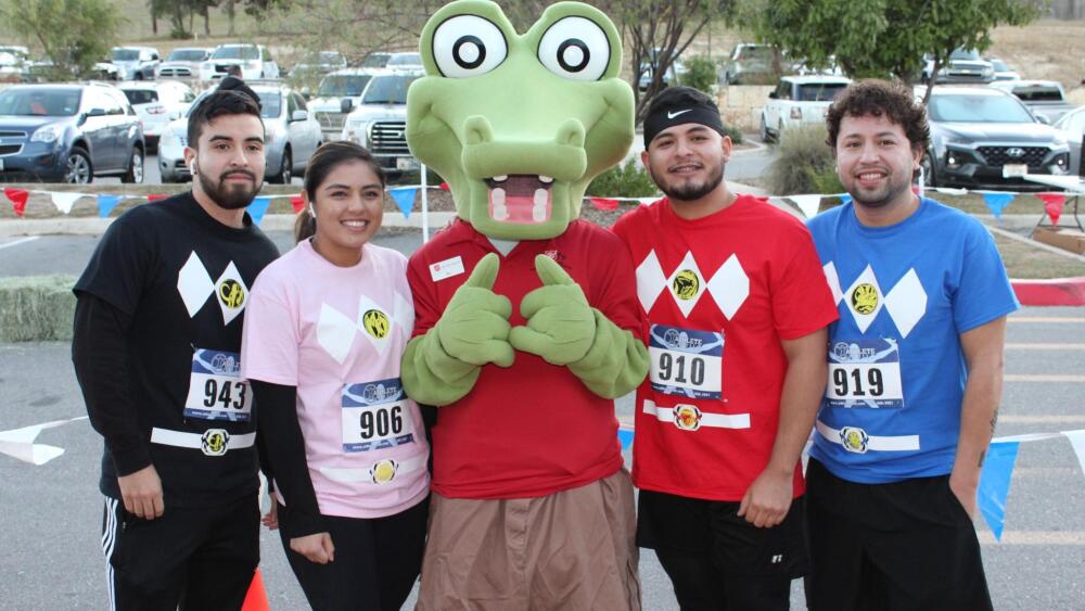 Participants in a Halloween-themed race