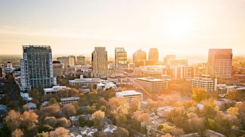 Drone shot of the Sacramento skyline at sunset