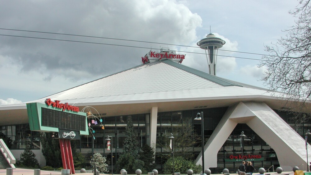 A view of Seattle's Key Arena with the Space Needle in the background