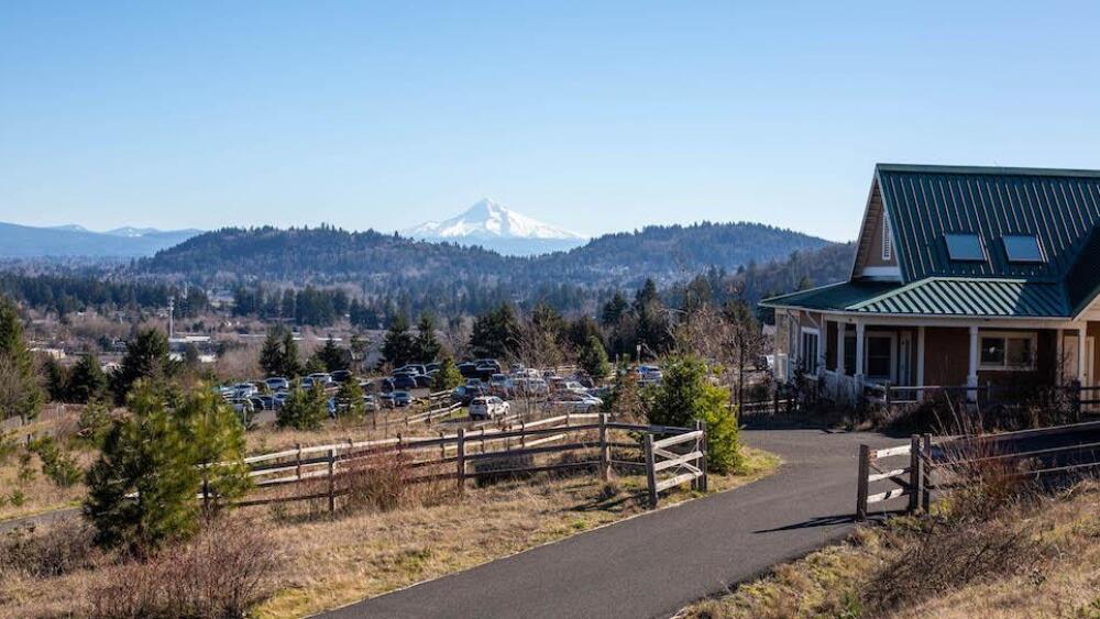 A view of the trailhead at Powell Butte Nature Park with Mount Hood in the background