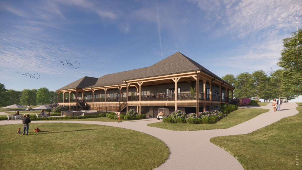 Rendering with blue skies and green grass featuring a large brown building with wrapped around front porch. Digital people are walking on sidewalks and driving golf carts, and playing in the yard.