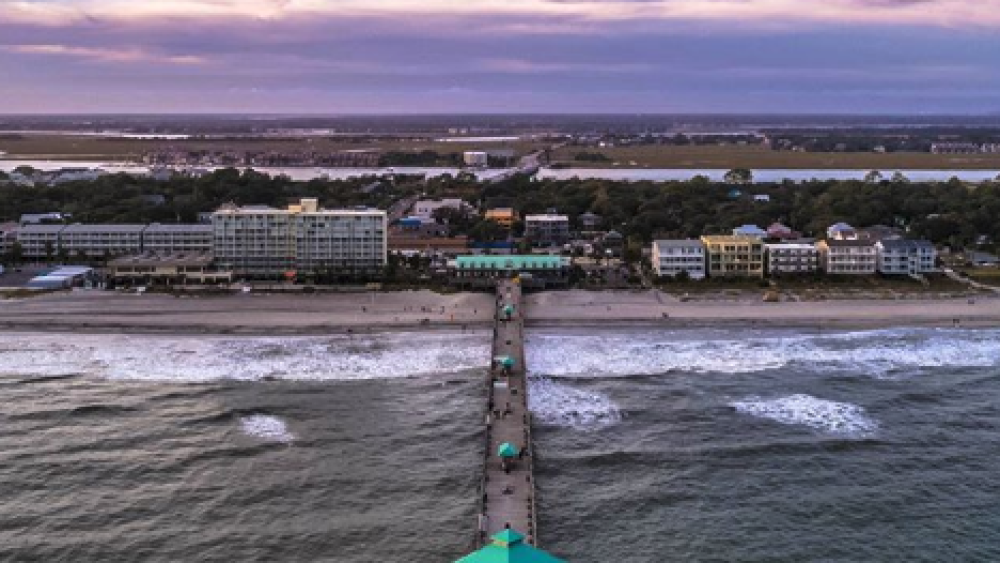 aerial shot of the folly beach pier