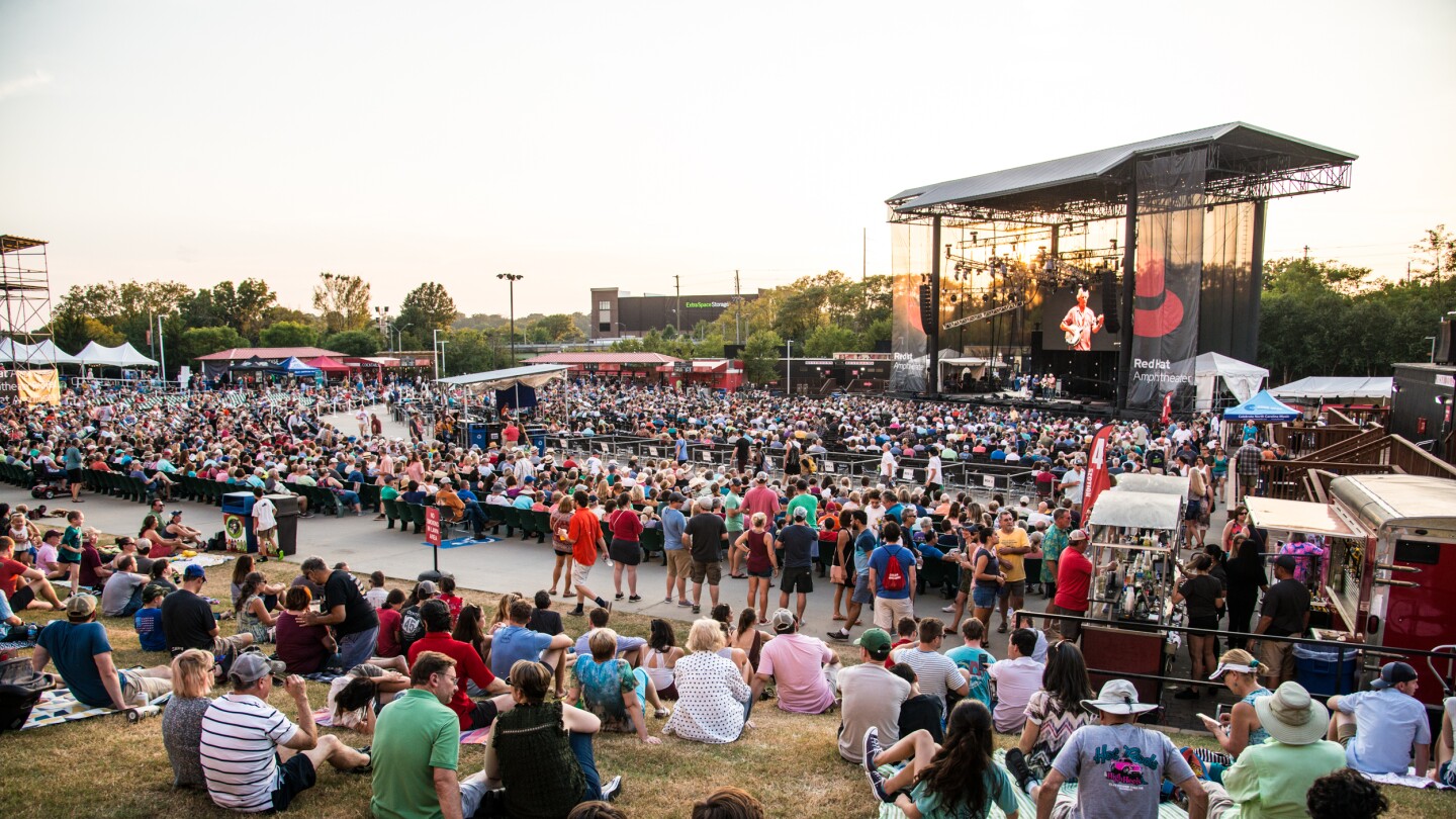 Attendees watch a concert at Red Hat Amphitheater. 