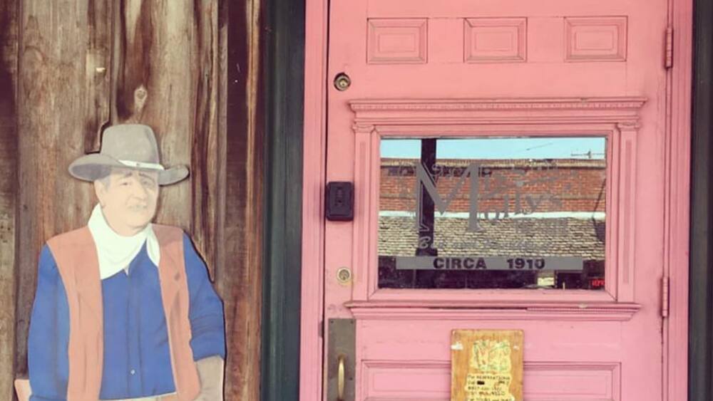 The door to Miss Molly's Hotel