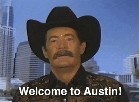 A gif of a man in a cowboy hat saying "welcome to Austin"
