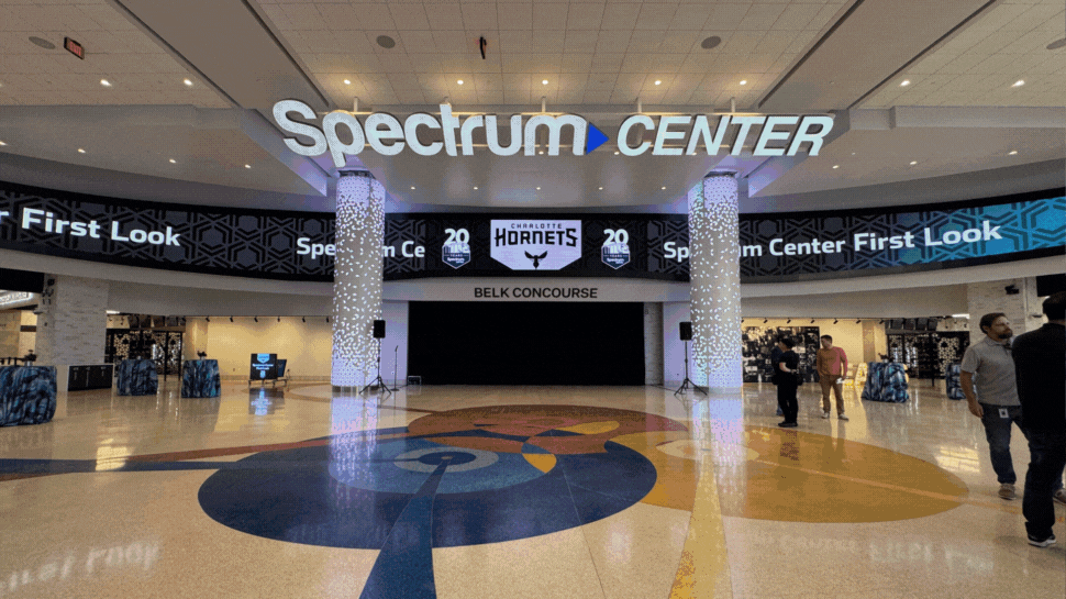 A rotating carousel of photos showing the updated renovations at the Spectrum Center.