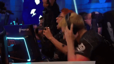 A gif of esports players celebrating after winning a game.