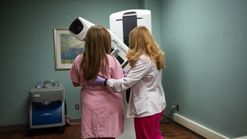 A woman preparing for her mammogram at Novant Health