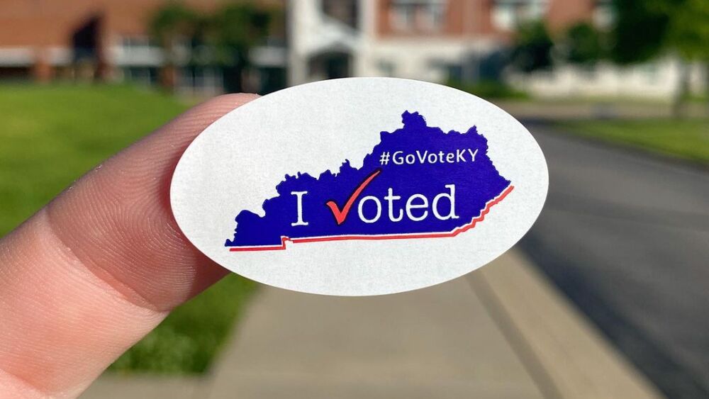 A sticker that says "I Voted #govoteky"
