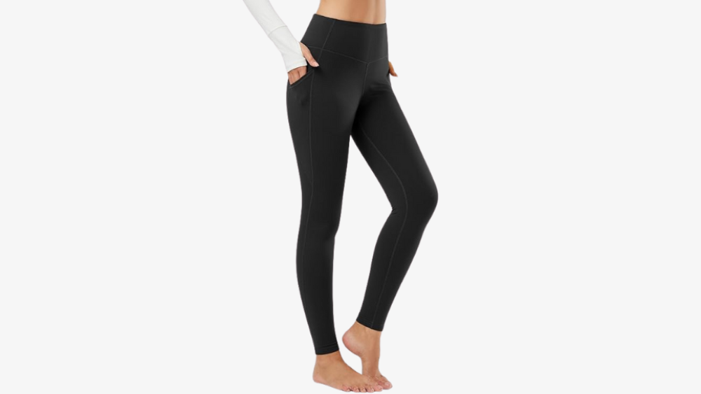 A woman models full-length leggings.