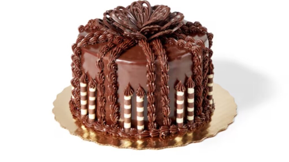 a chocolate cake with fancy decorations