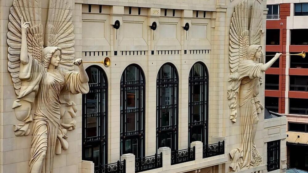 Photo of angel sculptures from across the street.