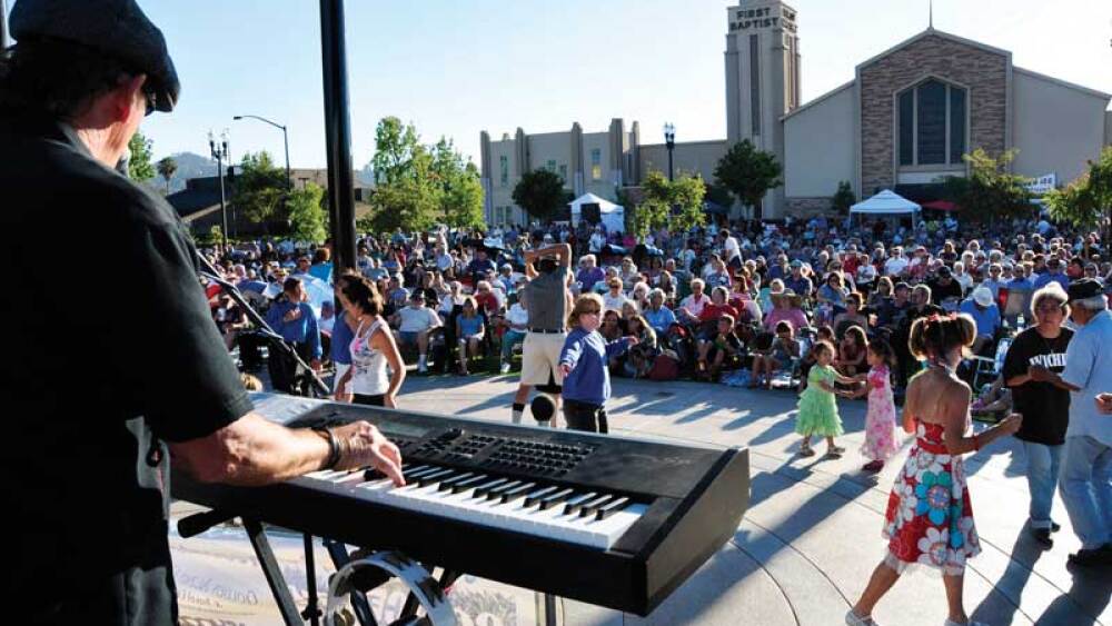 A man playing the keyboard at El Cajon's Dinner and a Concert series