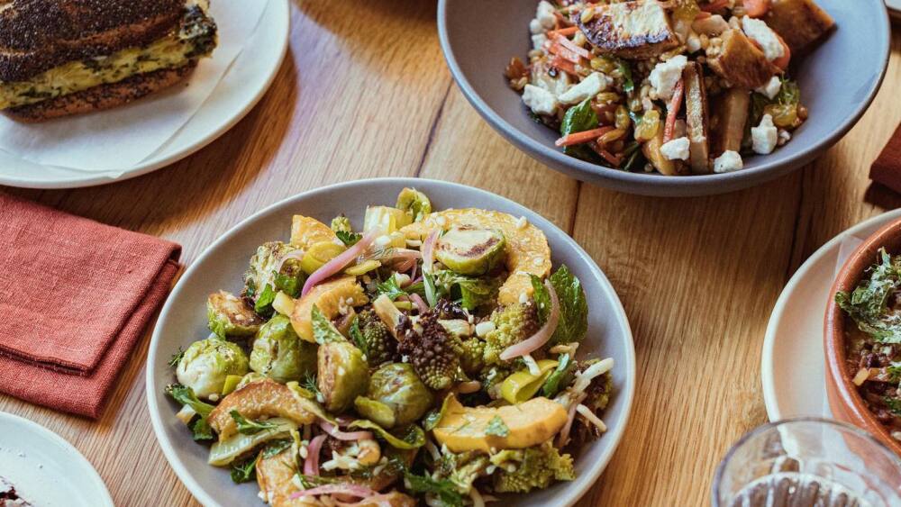 A table with salad dishes