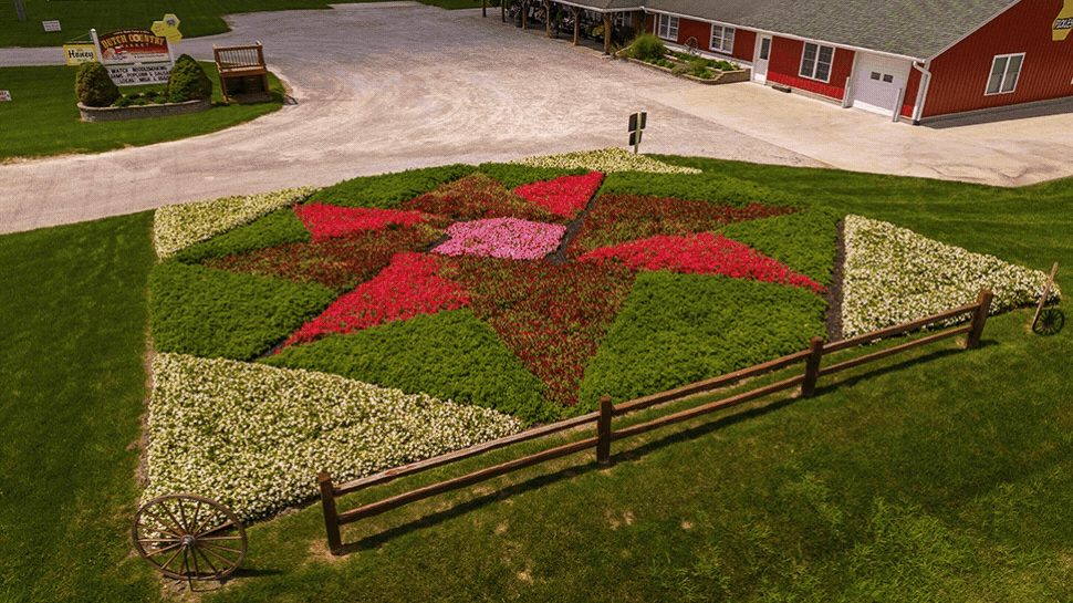 a gif featuring images of past quilt gardens