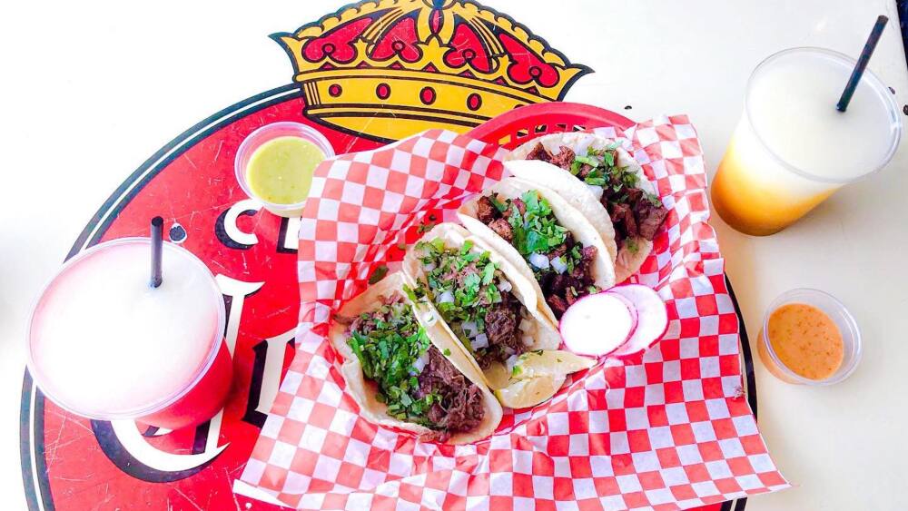 Photo of frozen margaritas and barbacoa tacos.