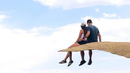 Sitting on Potato Chip Rock