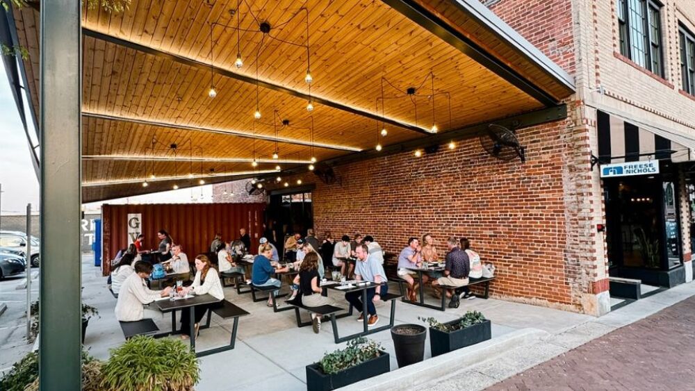 WStoday: People dining at Twisted Pine outdoor patio downtown Winston-Salem