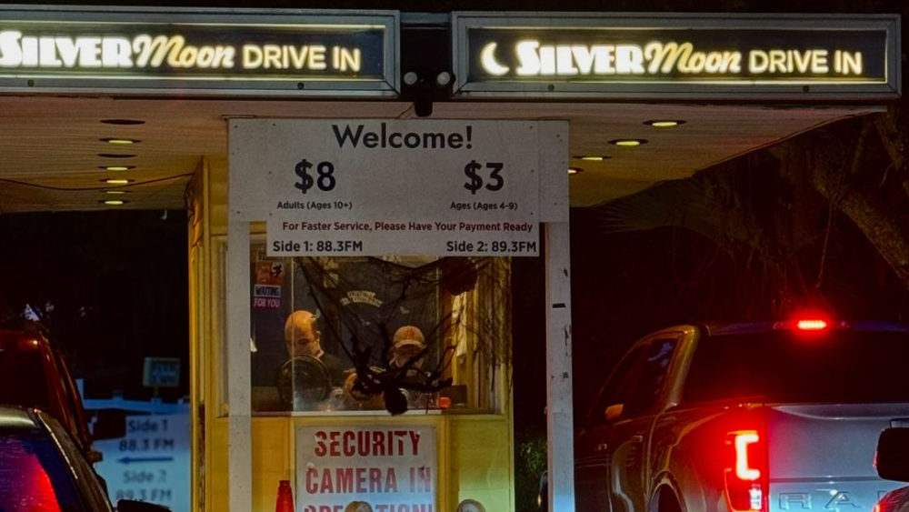 The ticket booth at the Silver Moon Drive-In with ticket prices listed