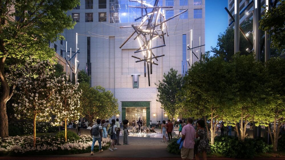 An artist's rendering of a new park space in Uptown Charlotte with a hanging light fixture above the plaza.