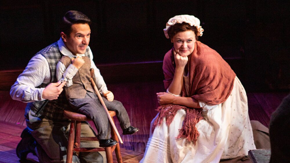 Dan Rosales and Jacque Wilke in "Ebenezer Scrooge's BIG San Diego Christmas Show" in 2022.