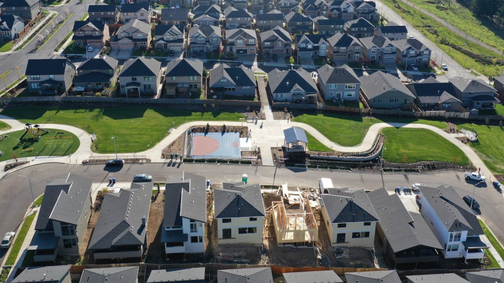 An aerial shot shows a new neighborhood with a playground and outdoor recreation center nearly completed in Pleasant Valley, a neighborhood in Gresham.