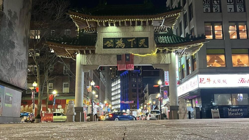 View of the Chinatown arch at night.