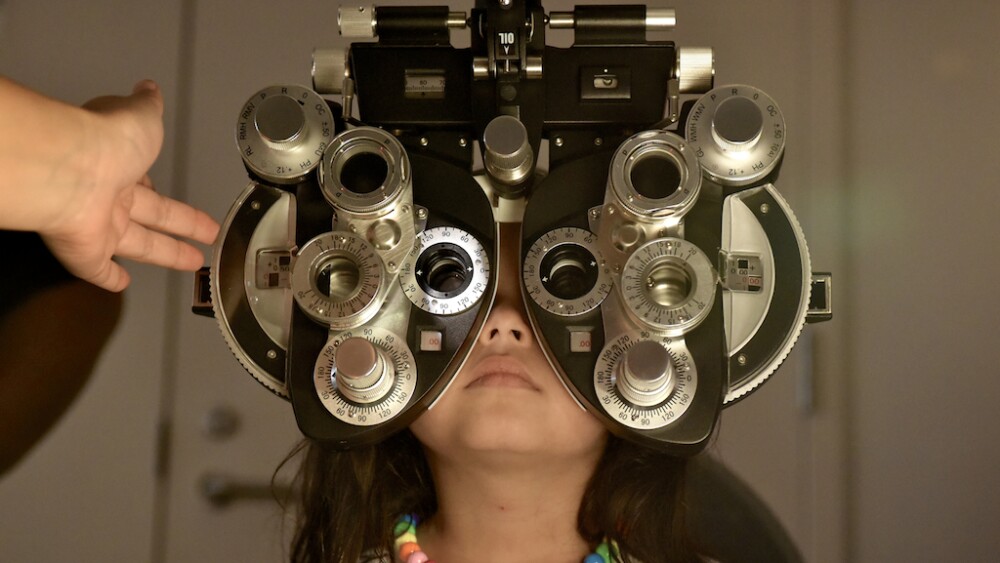 a girl getting an eye exam