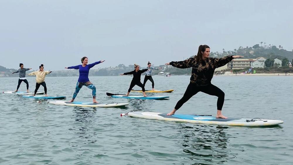 Floating yoga and paddleboarding in San Diego