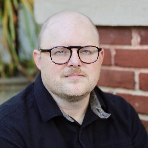David Stringer wearing a dark button-down shirt
