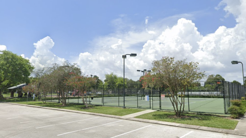 An outdoor pickleball court on a sunny day