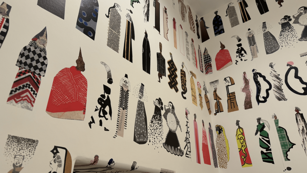 White wallpaper depicting figures from around the world.