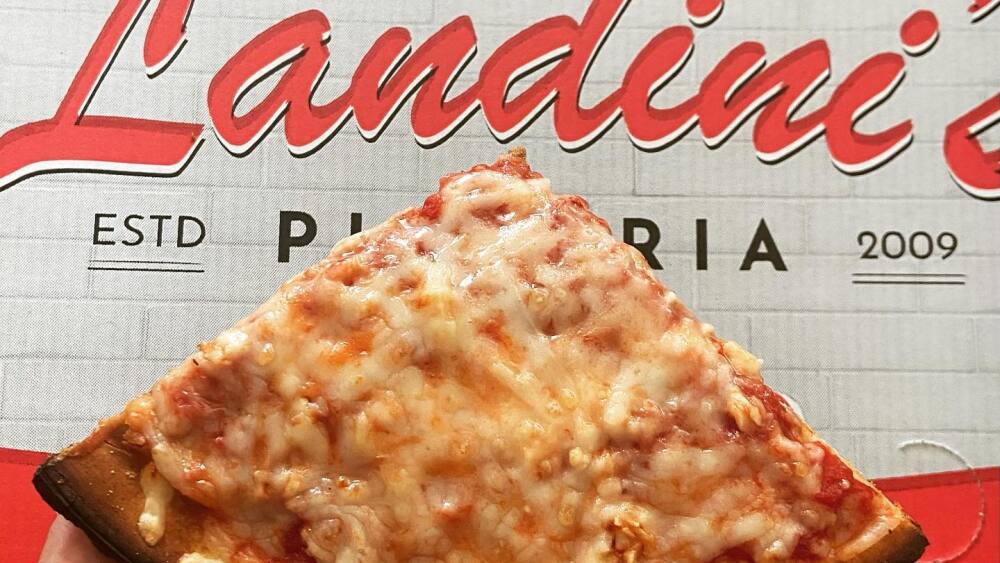 A slice of Landini's gluten-free pizza