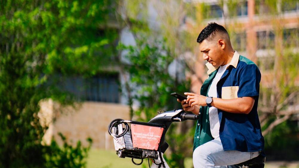 Man riding bicycle.