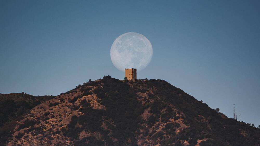 A supermoon above Mt. Umunhum.