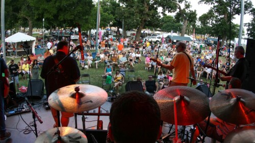 Band performing on a stage.
