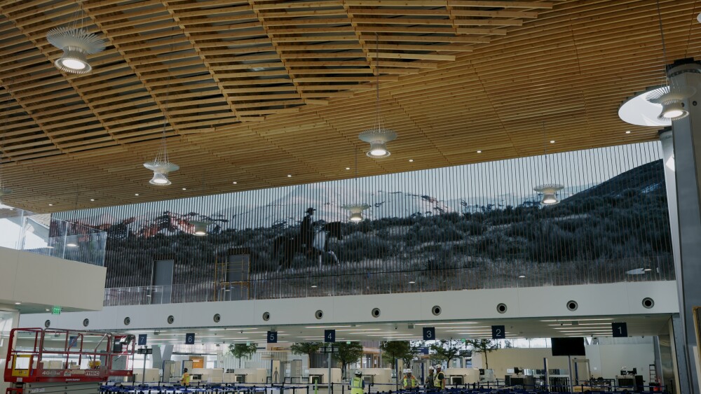 Cowboy Artwork over the security check lanes at Portland International Airport.