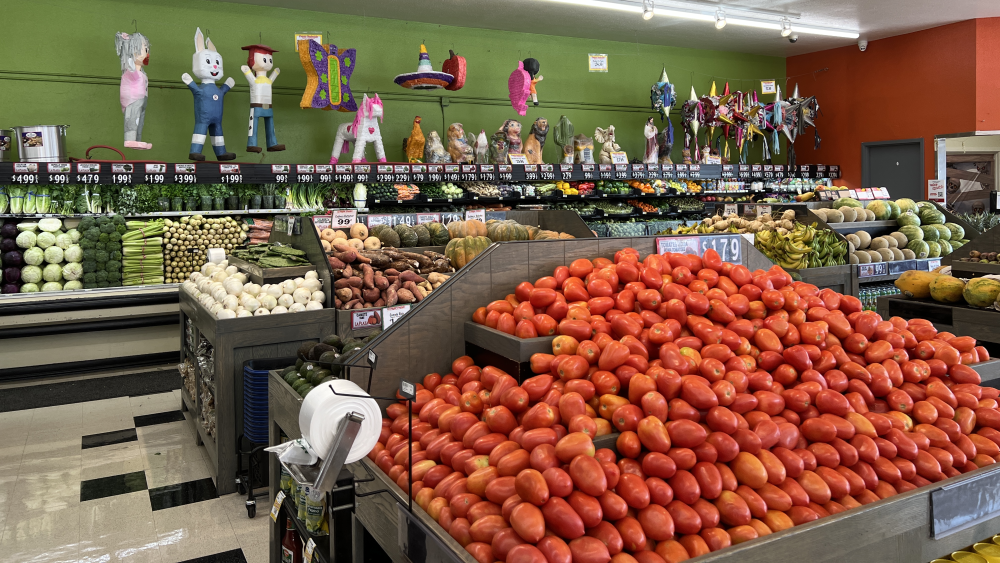 A grocery market's vegetable section.