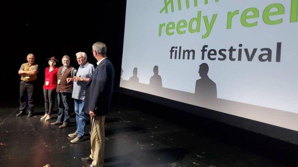 Image of people talking on a stage at the Reedy Reels Film Festival