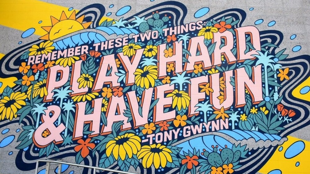 Remember these two things: Play hard and have fun mural