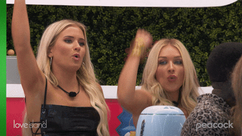 Two women from Love Island celebrating