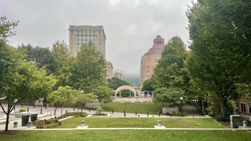 pack square park in front of city of asheville buildings