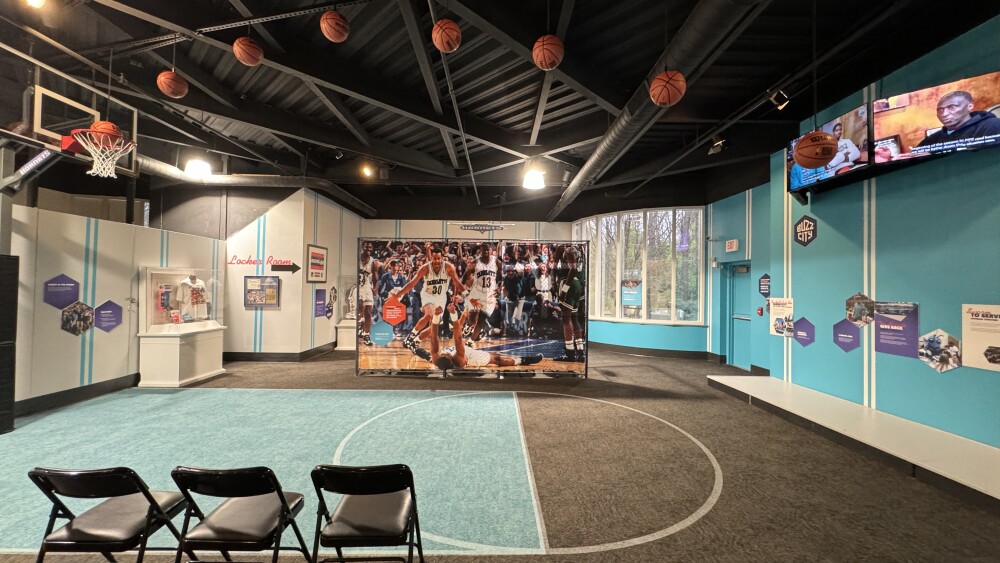 Several basketballs are suspended from the ceiling, recreating the game-winning, three-point shot from the Hornets during the '94 NBA Finals.