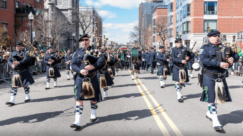 Musicians with bagpipes marching in a parade