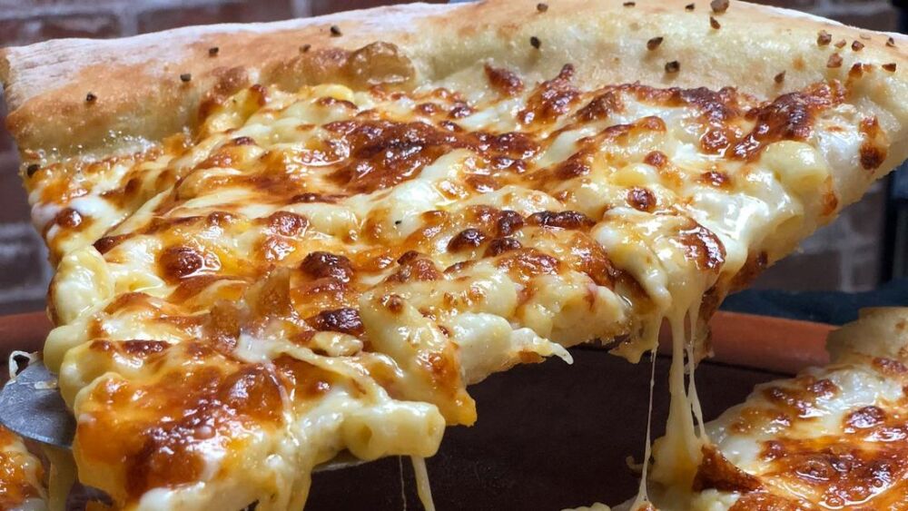 “Mac and Cheezus” as the Pizza of the Week at Mikey’s Late Night Slice | Photo by @latenightslice